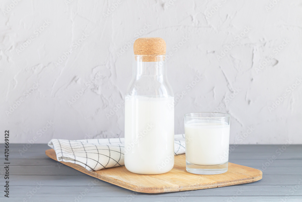 Glass jar with cork of yogurt, kefir, buttermilk Glass jar with cork of yogurt, kefir, buttermilk