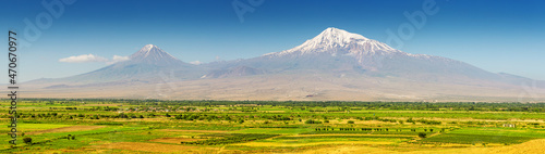 Panorama of Ararat mountain and farmland in the valley. Travel and nature background in Armenia photo