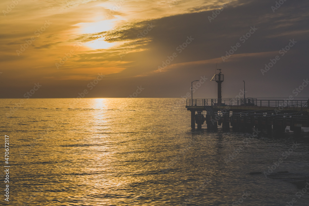 view of the sea pier at sunset view of the sea pier at sunset