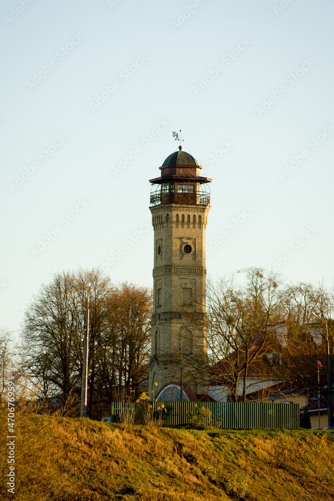 Grodno, Belarus. Old buildings of the synagogue and fire tower on a high hill.