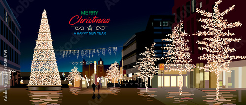 A tall Christmas tree planted in the middle of city streets on Christmas Eve.