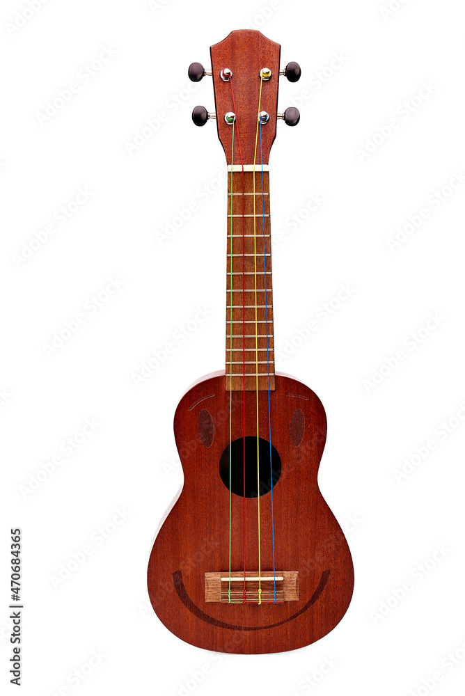 Fototapeta premium A small wooden ukulele with colorful strings on a white background in the studio