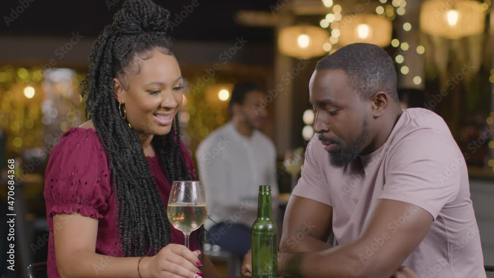 Close Up Shot of a Man and Woman On a Date In a Bar Close Up Shot of a Man and Woman On a Date In a Bar