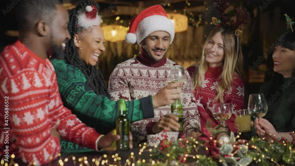 Tracking Shot Approaching Friends Toasting Drinks During Christmas Celebrations Tracking Shot Approaching Friends Toasting Drinks During Christmas Celebrations