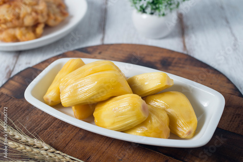 Jack fruit fritter, traditional yet delicious snacks for tea or coffee time and it's also good brunch. High view with rustic white background