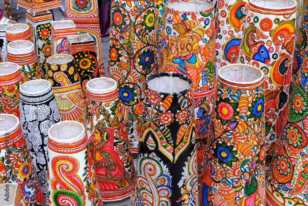 Vibrant colorful lampshades for sale at the Pune Crafts Mela in Maharashtra India, Interior decorative lamp shade of Tribal Artwork of Hindu God.
