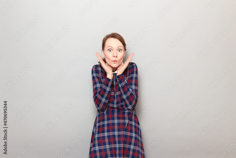 Portrait of surprised young woman shocked by news Portrait of surprised young woman shocked by news