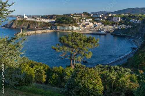 View of the Asturian city of Luarca. In the background the lighthouse and the picturesque cemetery by the sea. 