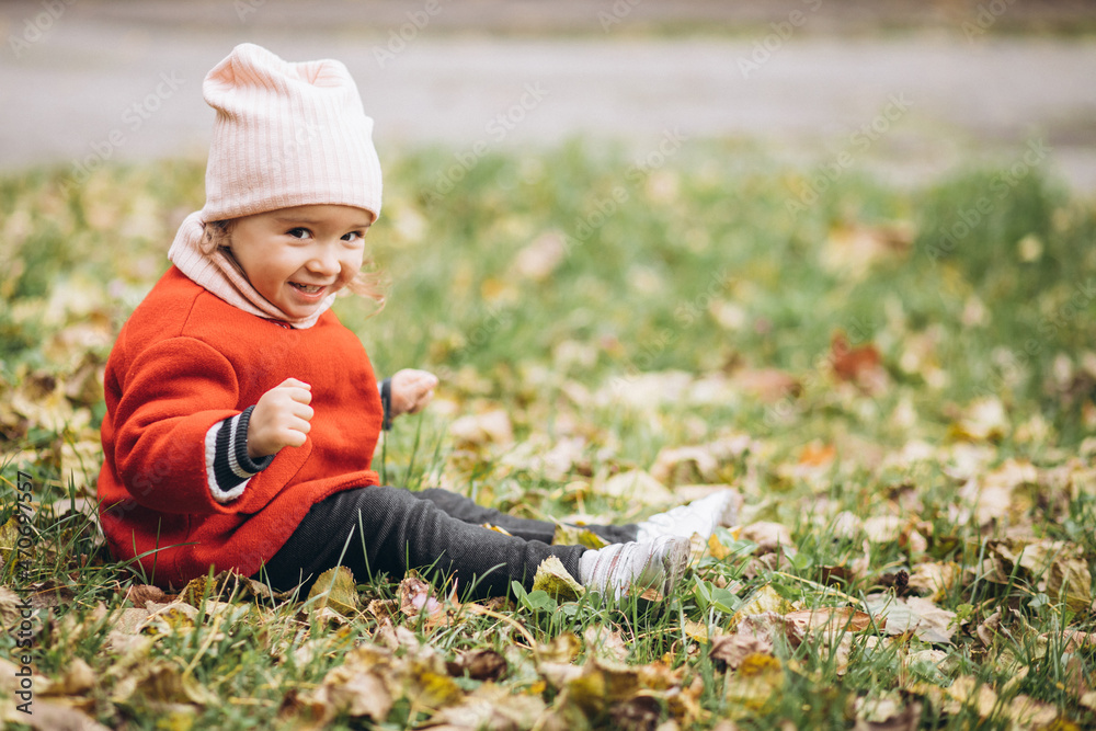 Cute little girl in an autumn park Cute little girl in an autumn park