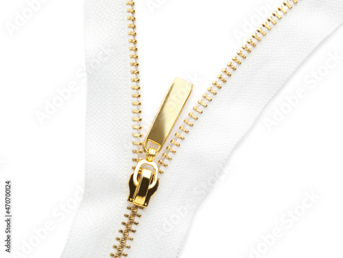 Golden zipper on white background, top view