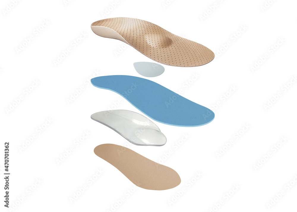 Medical insoles. Isolated orthopedic insoles on a white background. Treatment and prevention of flat feet and foot diseases. Foot care. Insole cutaway layers.