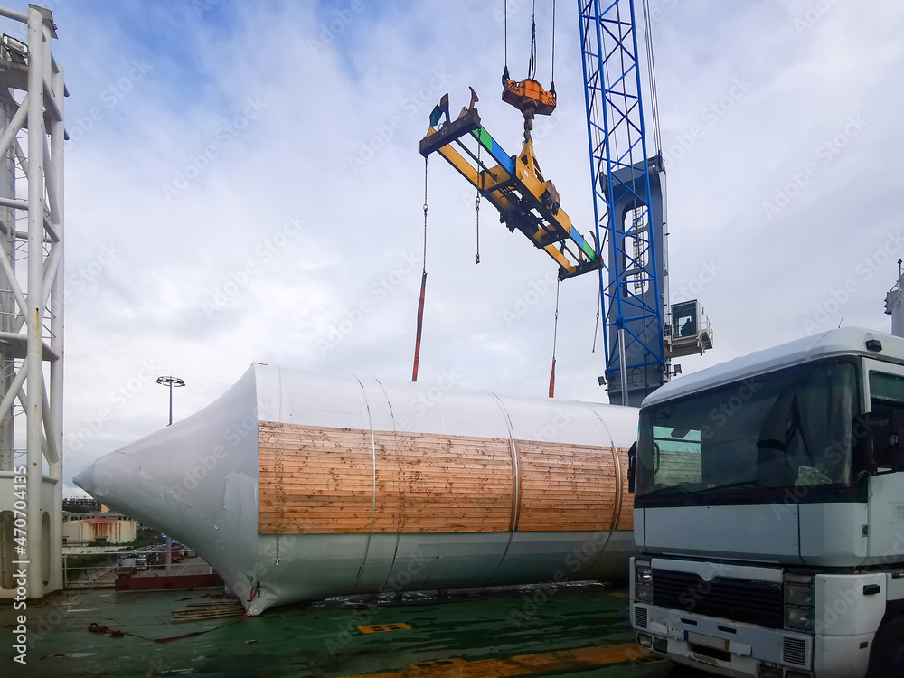 Φωτογραφία detail of big brewery tank discharged from a big roro vessel in conakry ,guinea