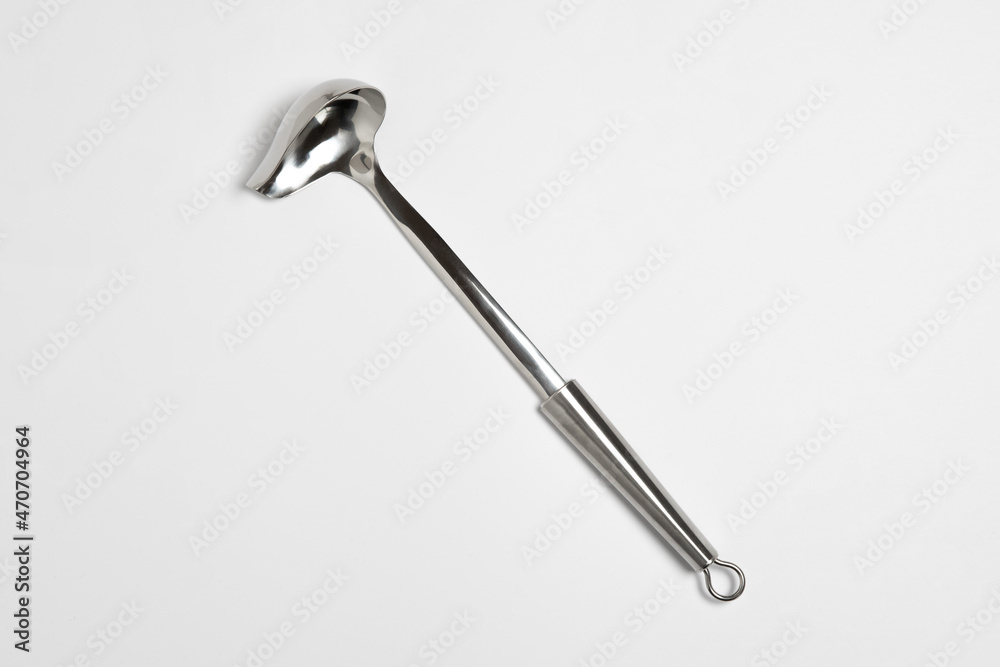 Metal kitchen soup ladle isolated on white background.High-resolution photo.Mock up