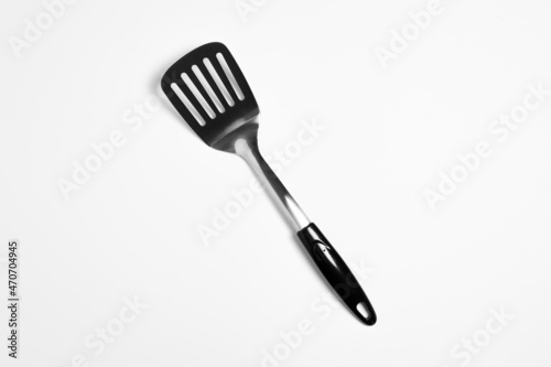 Kitchen Spatula Stainless steel isolated on white background. Slotted Spatula.High-resolution photo.Top view.