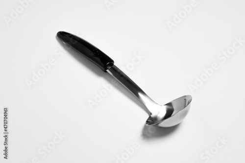 Metal kitchen soup ladle isolated on white background.High-resolution photo.Mock up