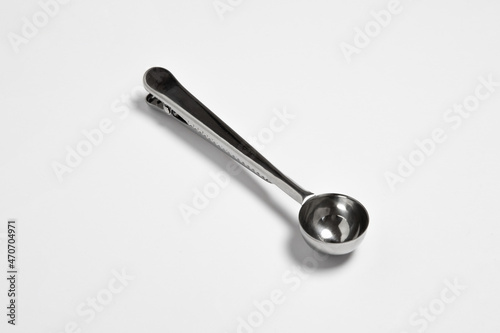 Coffee Measuring Spoon Stainless Steel With Sealing Clip isolated on white background.High-resolution photo.Mock up