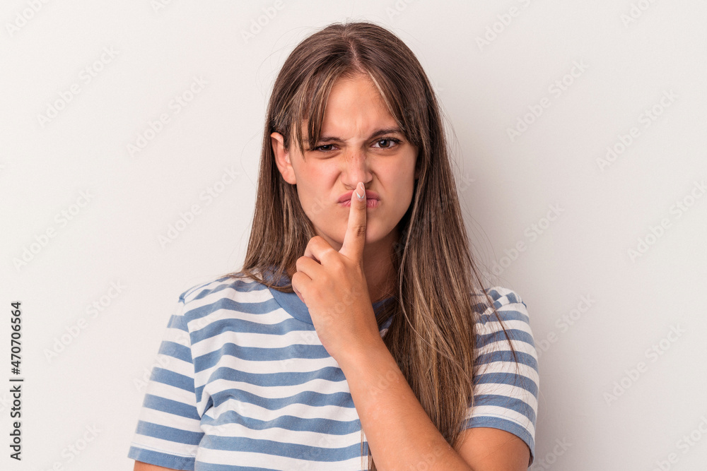 Young caucasian woman isolated on white background thinking and looking up, being reflective, contemplating, having a fantasy. Young caucasian woman isolated on white background thinking and looking up, being reflective, contemplating, having a fantasy.
