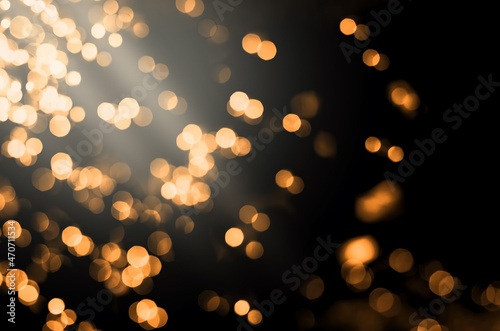 bright orange lights on a black background © VeKoAn
