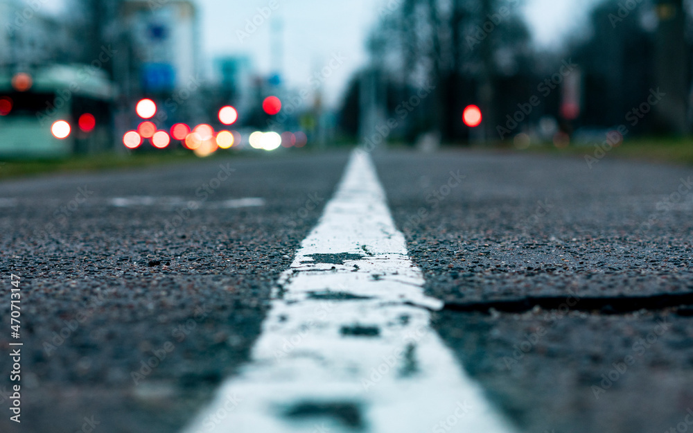 White stripe, black road White stripe, black road