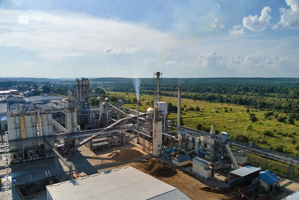 Aerial view of oil and gas refining petrochemical factory with tall refinery plant manufacture structure. Aerial view of oil and gas refining petrochemical factory with tall refinery plant manufacture structure.