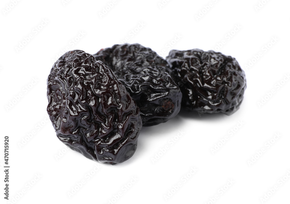 Sweet dried prunes on white background. Healthy snack Sweet dried prunes on white background. Healthy snack