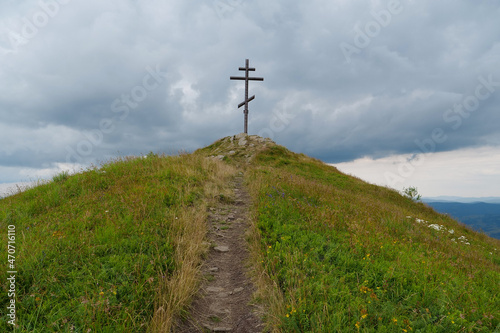 Metal cross in Carpathian Mountains in Ukraine