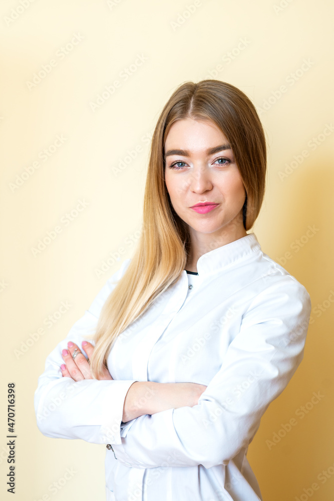 Closeup portrait of a female healthcare professional, dentist, doctor, nurse, the assistant on light yellow background. Closeup portrait of a female healthcare professional, dentist, doctor, nurse, the assistant on light yellow background.
