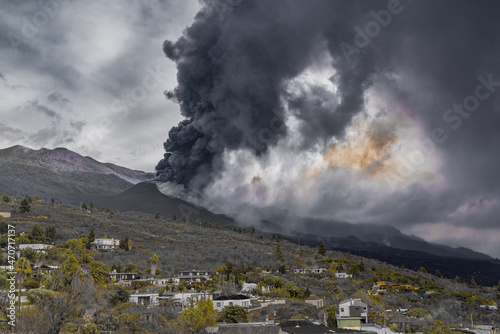 The Cumbre Vieja volcano eruption with black smoke on the Canary island of La Palma, Spain