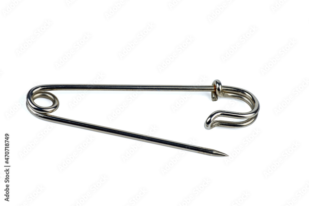 Beauty elegant safety pin broche isolated on white background Beauty elegant safety pin broche isolated on white background