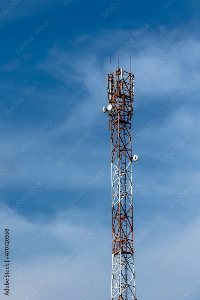 communication tower on the background of the sky