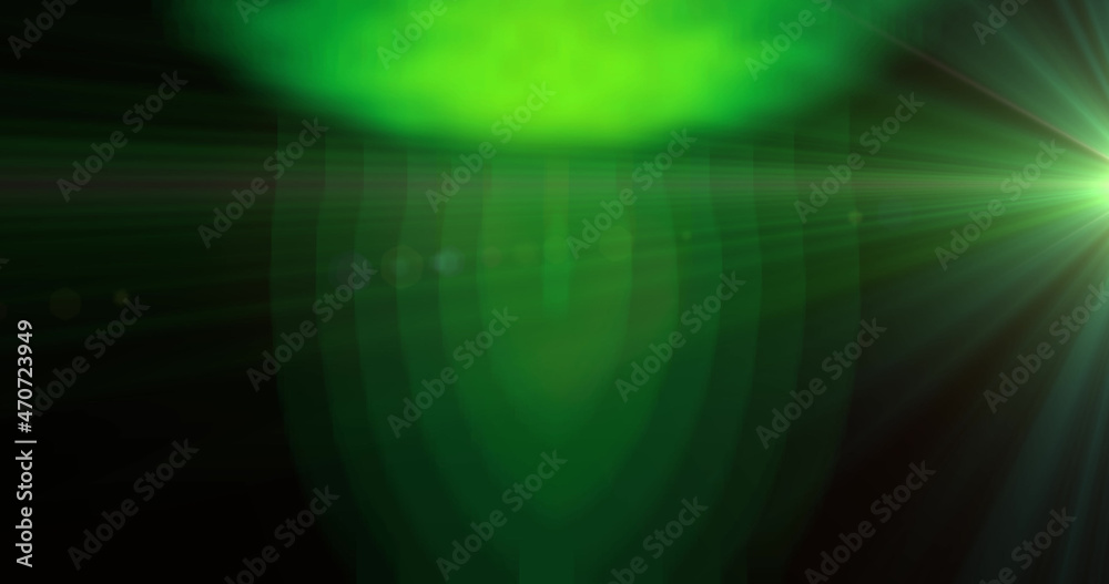 Image of glowing green form and refracted green light moving on black background