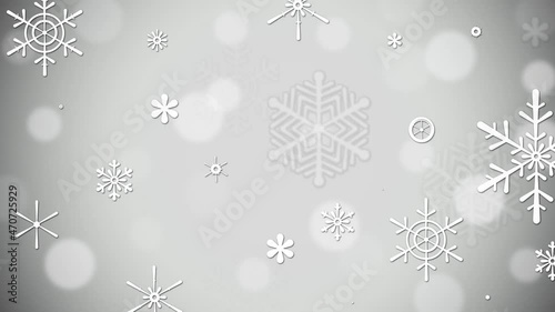 Shiny glitter with Freezing Snowflakes on a gray, silwer background with bokeh. Loop Winter Christmas background, Merry Christmas and New Year Holiday. 4K animation photo