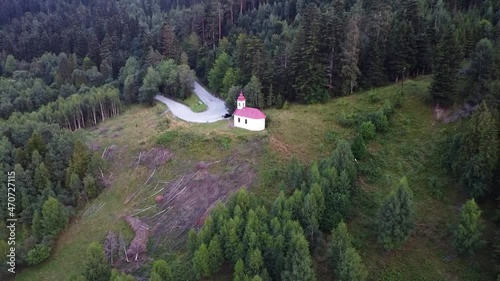 View of a small church in the mountains in Slovakia. Kaplnka Panny Márie (Holmikova). Village Smolník near Kosice. Drone Video. Slovakia. Europe photo