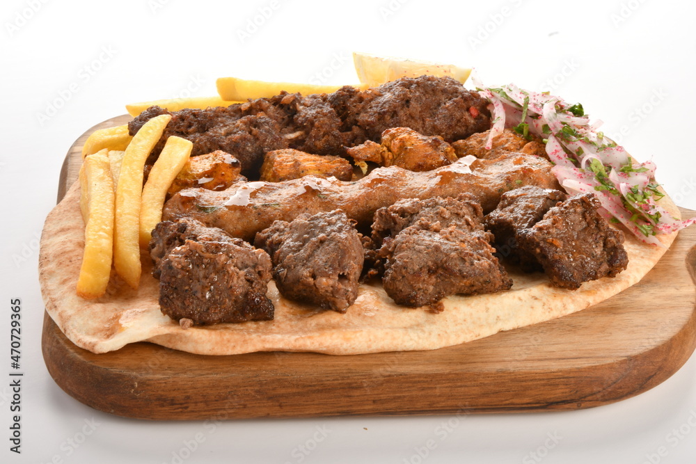 Kebab, traditional Turkish, Greek meat and chickens food, isolated on white background Kebab, traditional Turkish, Greek meat and chickens food, isolated on white background