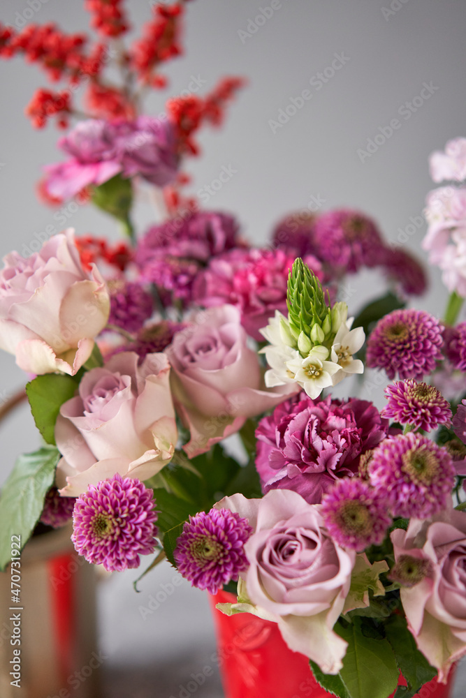 Finished flower arrangement in a vase for home. Flowers bunch, set for interior. Fresh cut flowers for decoration home. European floral shop. Delivery fresh cut flower.