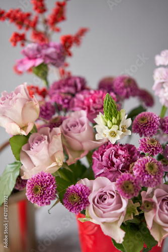 Obraz na płótnie Finished flower arrangement in a vase for home. Flowers bunch, set for interior. Fresh cut flowers for decoration home. European floral shop. Delivery fresh cut flower. w salonie