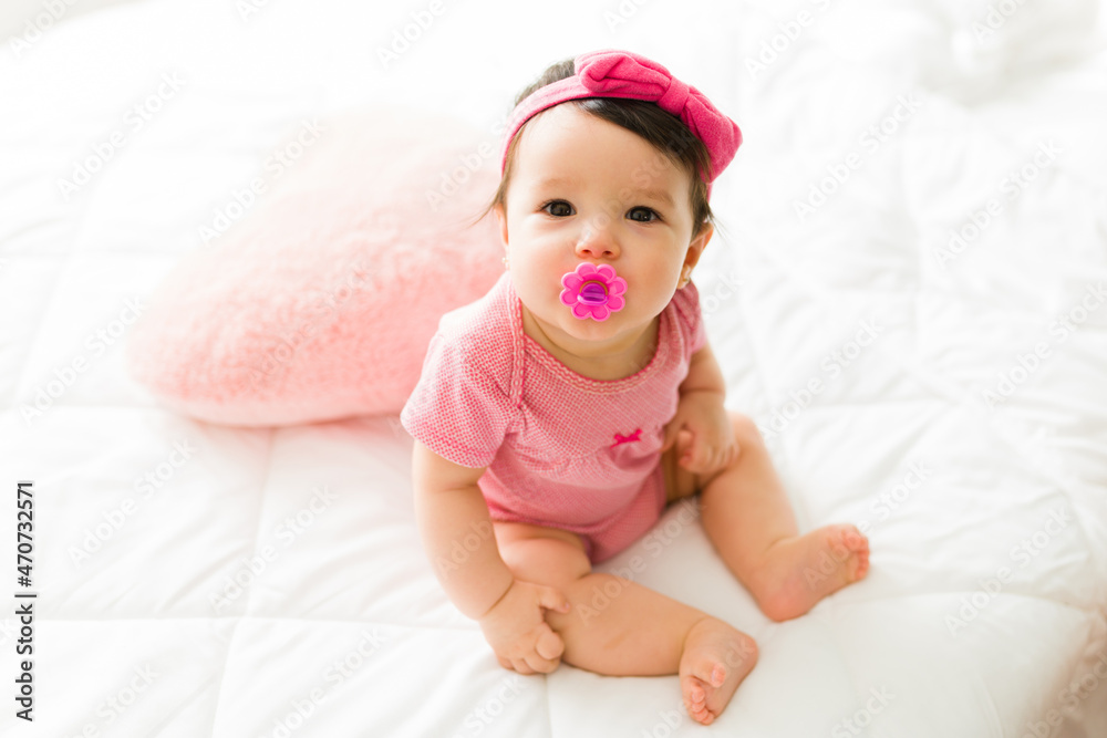Beautiful little baby resting in bed Beautiful little baby resting in bed