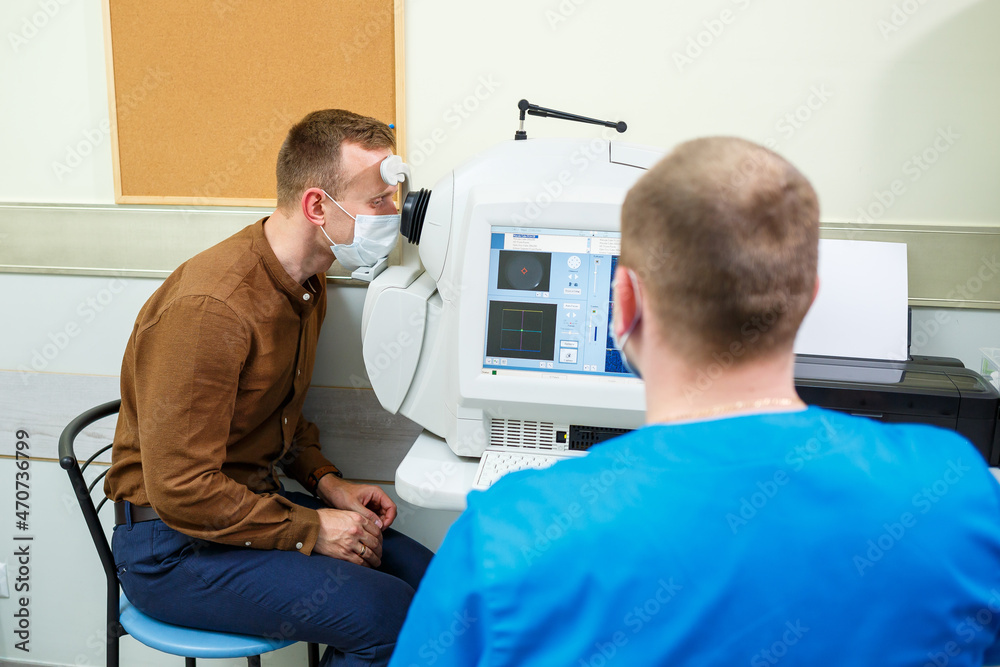 Professional medical equipment scanning the patient's eyes. The device of a modern healthcare clinic.
