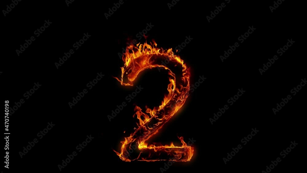 Super Slow Motion Shot of Burning Number 2 Isolated on Black Background at 1000 fps. Super Slow Motion Shot of Burning Number 2 Isolated on Black Background at 1000 fps.