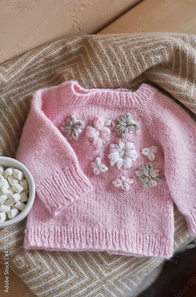 Knitted kids clothes and accessories for knitting. Needlework and knitting. Hobbies and creativity. Knit for children. Handmade Knitted kids clothes and accessories for knitting. Needlework and knitting. Hobbies and creativity. Knit for children. Handmade