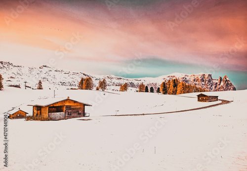 amazing winter landscape with snow at sunrise in Alpe di Siusi. Dolomites  Italy - winter holidays destination photo