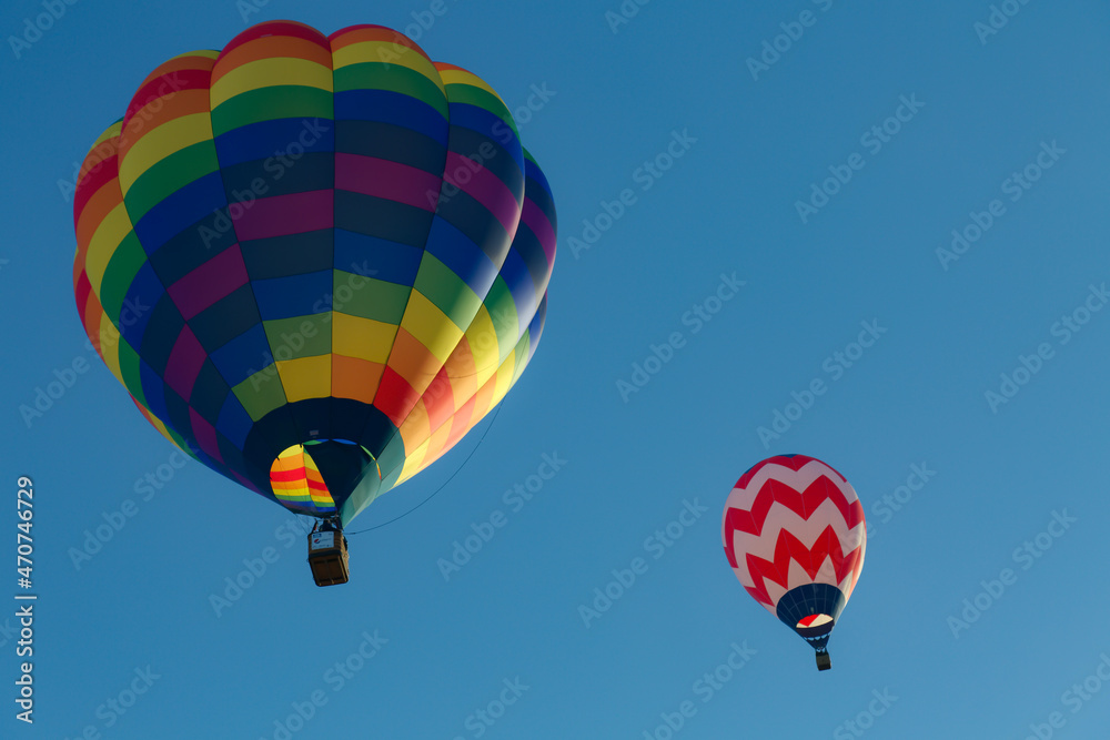 hot air balloon flying high in the Arizona sky hot air balloon flying high in the Arizona sky