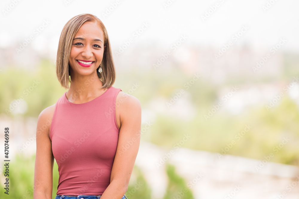 Millennial Indian mixed race woman with fashionable hairstyle. 