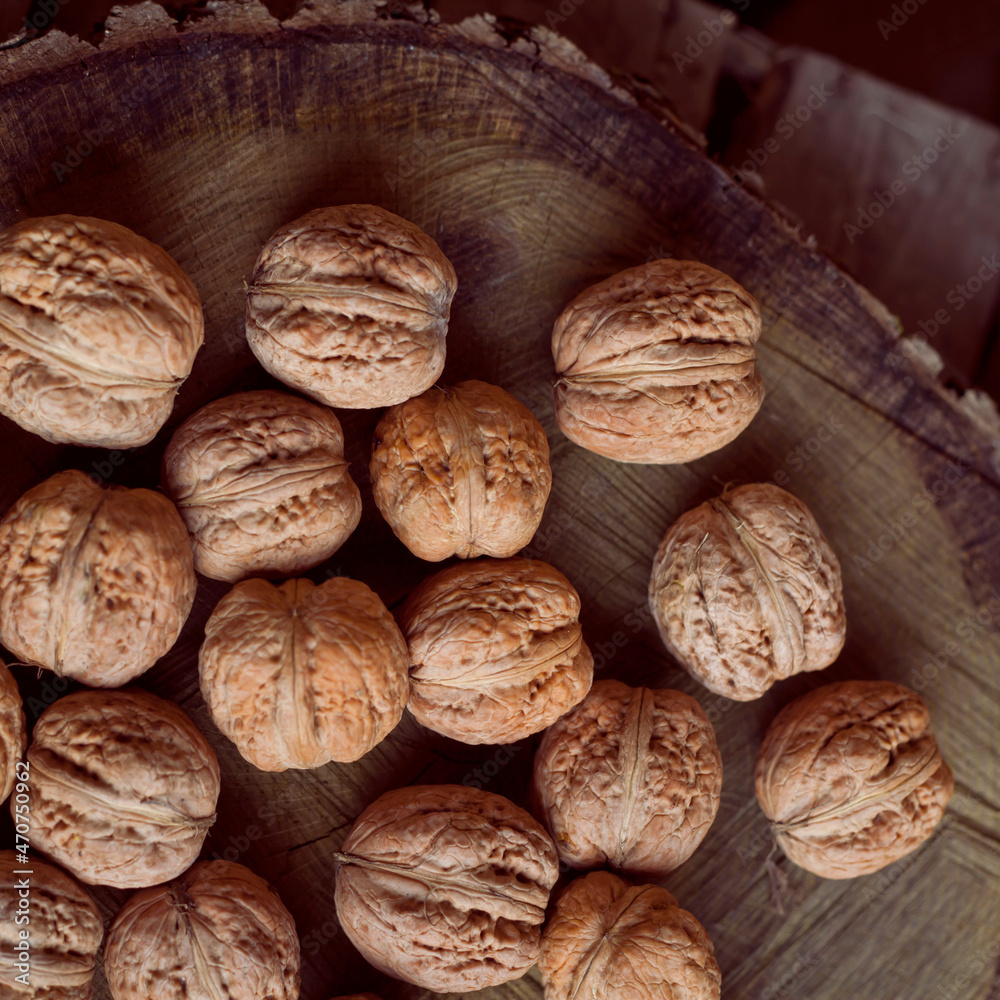 Walnut Nuts - healthy food, produce the juglans regia tree in the nut orchard. Walnut Nuts - healthy food, produce the juglans regia tree in the nut orchard.
