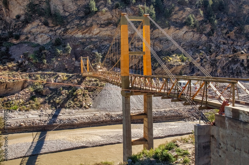 Mountain bridge on river Baspa on way to Narkanda Himachal Pradesh, India photo