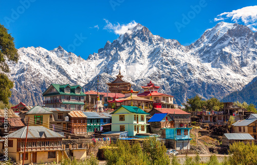 Scenic Himachal village at Kalpa with majestic Kinnaur Kailash Himalaya mountain range at Himachal Pradesh India photo