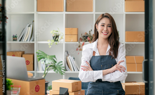 Young female entrepreneur successful with her SME business.