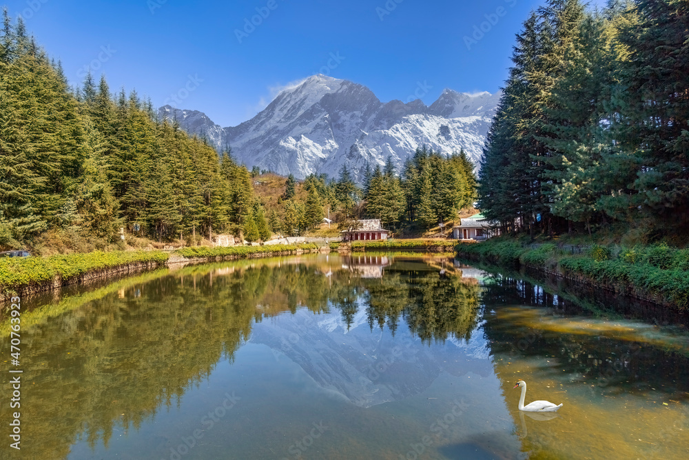 Scenic mountain lake with Kinnaur Kailash Himalaya snow peaks at Narkanda, Himachal Pradesh, India