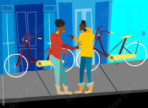 Gay couple talking on the street next to their bicycles 