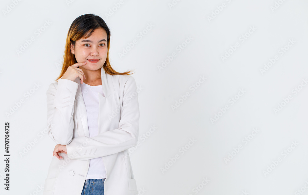 Portrait studio shot of Asian trendy fashionable urban beautiful happy dyed hair female model in casual long suit t shirt and denim jeans standing smiling look at camera posing on white background Portrait studio shot of Asian trendy fashionable urban beautiful happy dyed hair female model in casual long suit t shirt and denim jeans standing smiling look at camera posing on white background